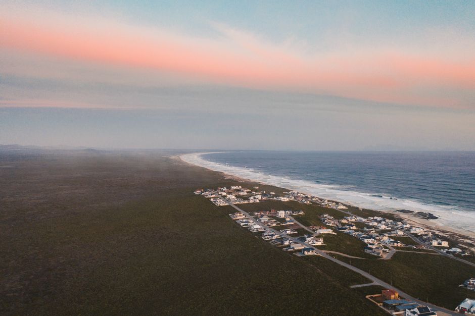 Aerial view of a coastal town and its beaches